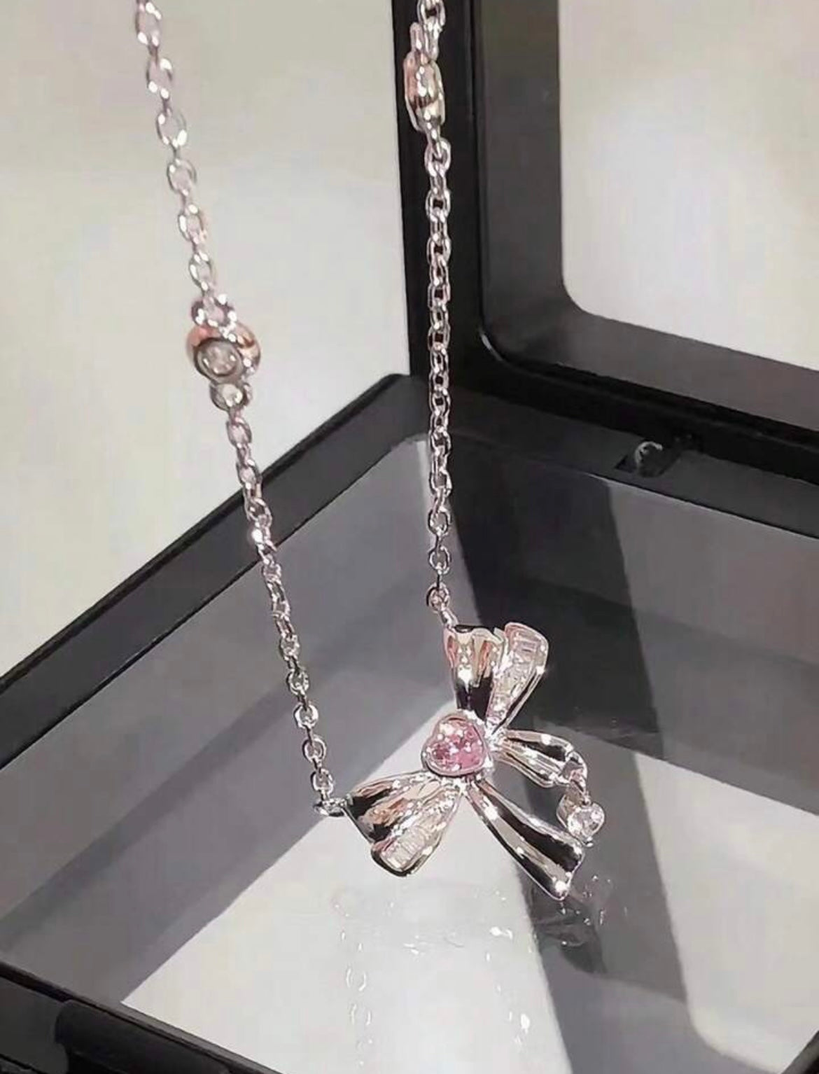 pink gem bow necklace